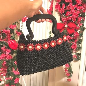 Vintage beaded bag with red flowers wood handle